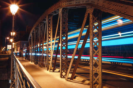 night view of the streets of the city of wroclaw with bridgesの写真素材