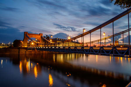 evening view of the grÃ¼nwald bridge in wroclaw in polandの写真素材