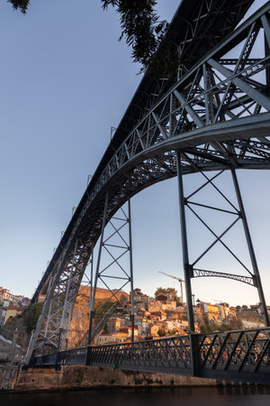 bridge over the douro river in the city of porto in autumn in portugalの写真素材