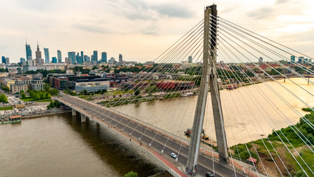 panoramic aerial view of Warsaw city at sunset in summer over the riverの写真素材