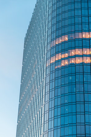 windows of a Warsaw skyscraper at sunset in Poland in the spring