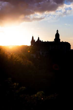 view of the valley with KsiÄÅ¼ Castle in Poland at sunset in springの写真素材