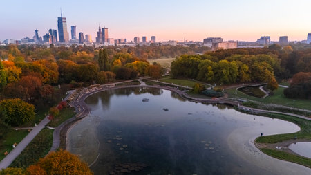aerial view of warsaw morning panorama with park in background at dawn in autumnの写真素材