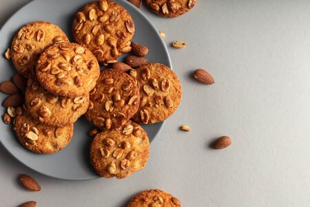 Biscuits on a plate top view. White background and copy space. Vkusnoe biscuits for Breakfast in the plate.の写真素材