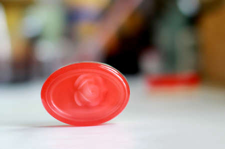 Red Glycerin Soap Buried roses inside, close-up shot, handmade soap.の写真素材