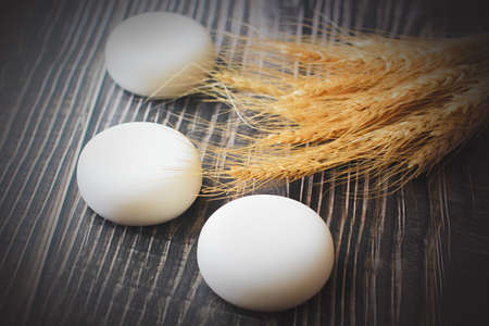 Handmade herbal glycerin soap laid on old wooden floor., Towels and toothbrushes are provided.の写真素材