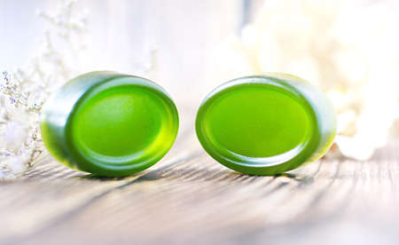 Handmade soap, Organic green soap close-up photo on wooden background.の写真素材