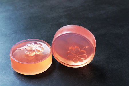 Pink glycerin soap on the background is old wood., Product care about clean and soft body skin.,...
