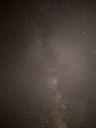 Night sky with stars and nebula as background, long exposure photograph