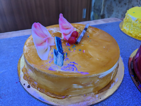 Birthday cake with a candle on top, closeup of photo