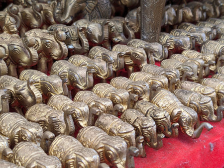 Elephants made of metal in a Buddhist temple, closeup of photoの写真素材