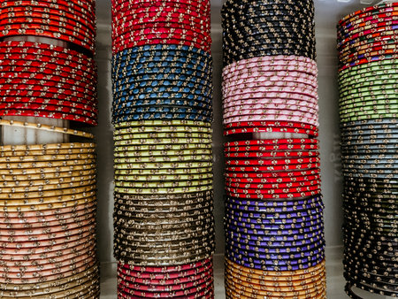 Colorful bracelets for sale on a shop window in India.