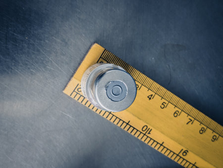 measuring tape on steel background, closeup of photo with soft focusの写真素材
