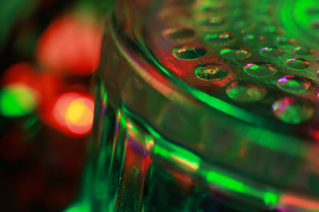 Colorful Christmas lights in a glass jar close-up macro photographyの写真素材