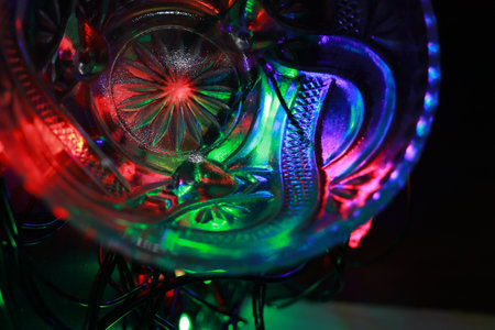 Colorful LED light in a glass vase. Abstract background.の写真素材