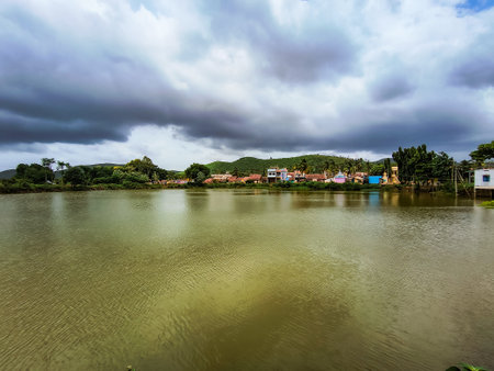 Beautiful view of the river and cloudy sky in the countryside..