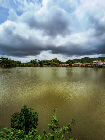 Beautiful view of the river and cloudy sky in the countryside.の写真素材