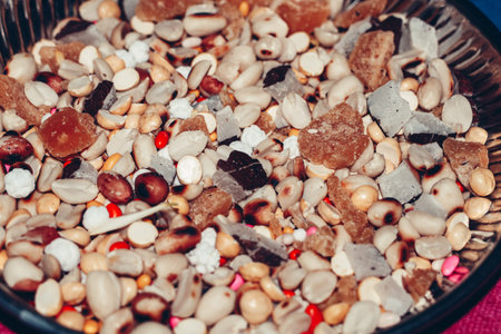 Mix of nuts and candies in a bowl. Selective focus. nature.の写真素材