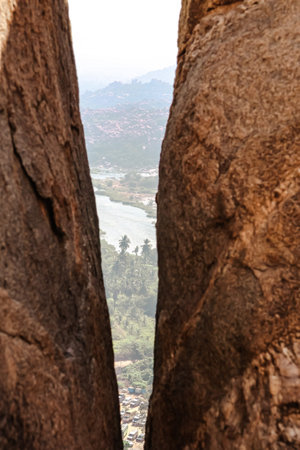 view from the top of the mountain to the city of Hampi.の写真素材