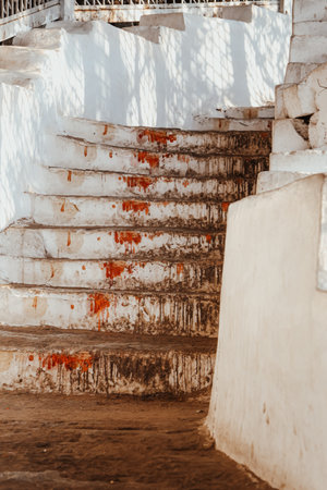 Ascending the stone steps of Anjanadri Hill towards the sacred Hanuman temple in Karnataka, India.の写真素材