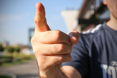 Angry caucasian man threatening with fingerの写真素材