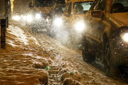 Traffic jam in heavy snowの写真素材