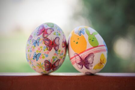 Colorful easter egg decoration with flowersの写真素材