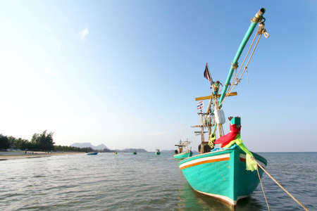 Green boat in the seaの写真素材