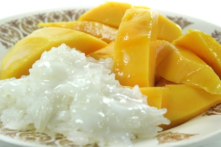 Thai Mango with Sticky Rice and Coconut Sauce Dessertの写真素材