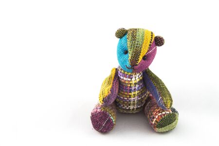 Handicraft colorful  bear on a white backgroundの写真素材