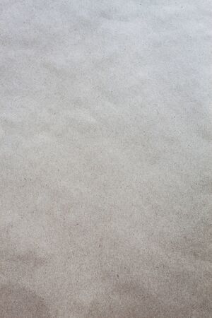 Paper texture background in beige gradient colorの写真素材