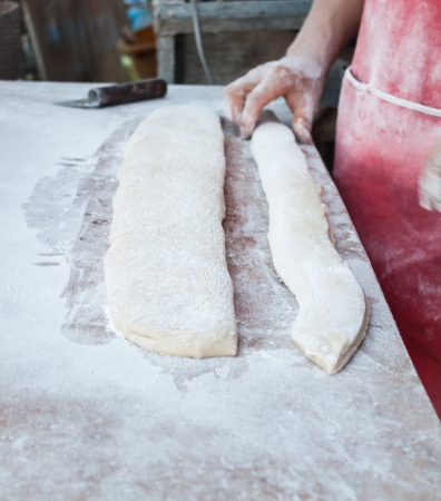 Threshing and cutting flour of deep fried dough stickの写真素材