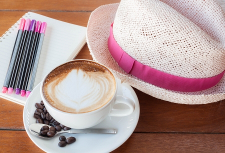 Time to relax with cup of coffee and think noteの写真素材