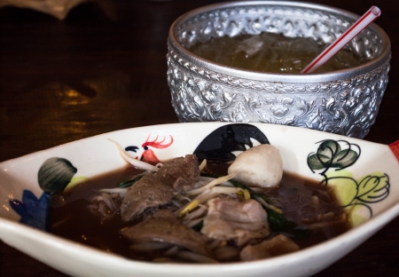 Northern of thailand style pork noodle soup の写真素材