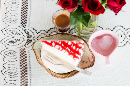 Romantic coffee and cake on white lace tableの写真素材