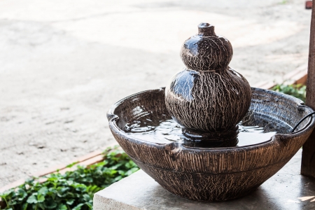 Jar fountain decorated home  gardenの写真素材