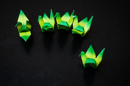 A group of green paper birds, shallow depth of fieldの写真素材