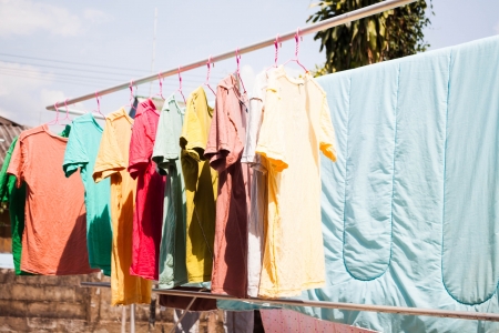 Dry clothes in the air with sun lightの写真素材