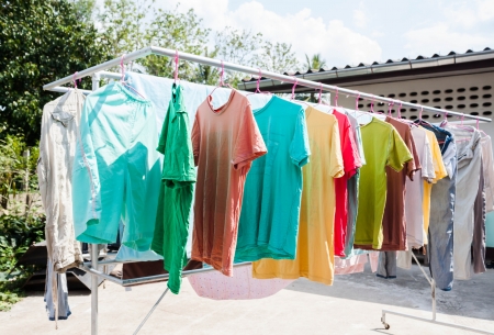 Laundry hanging out to dry outdoors in summerの写真素材