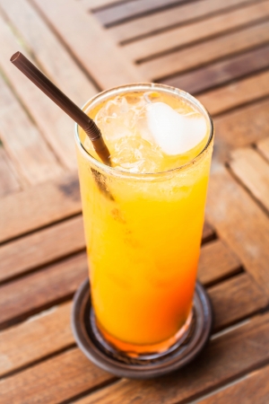 Fresh orange juice with heart ice cubeの写真素材