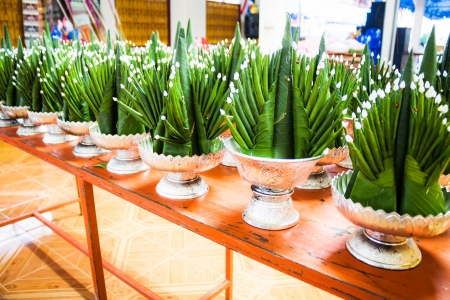 Lot of banana leaf rice offerings in metal trayの写真素材
