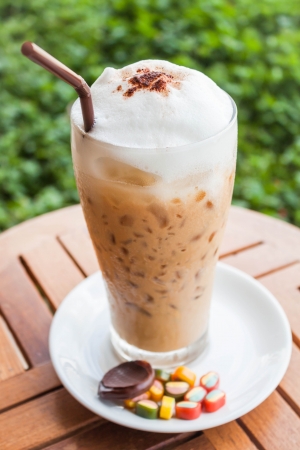 Refreshing iced milk espresso and some sweetの写真素材