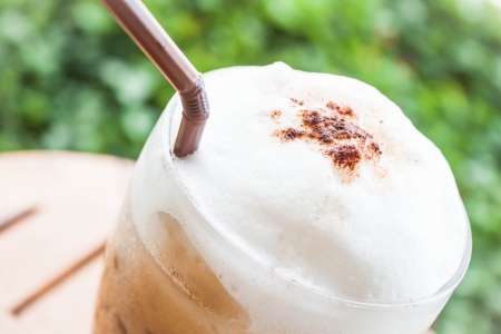 Close up of milk micro foam on frappucinoの写真素材