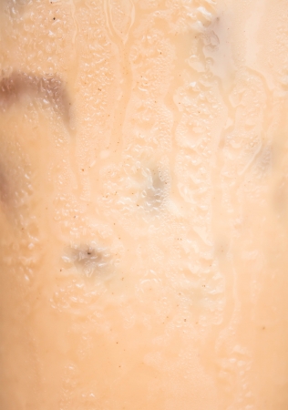Fizzy glass of iced espresso up closeの写真素材