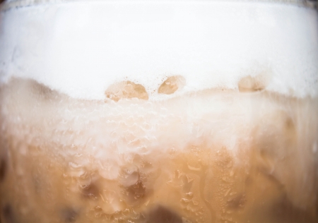 Wave of milk micro foam on frappucinoの写真素材