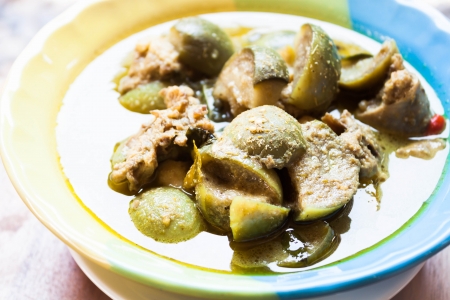 A bowl of spicy green curry, thai traditional foodの写真素材