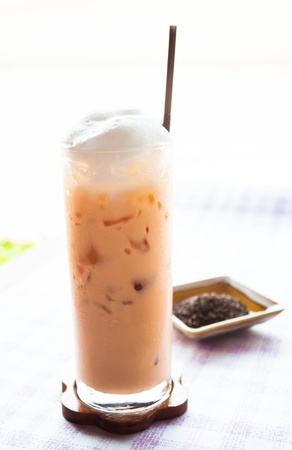 A glass of cold thai milk teaの写真素材