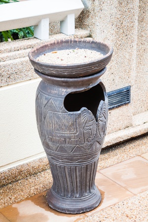 Park ceramic trash bin in smoking areaの写真素材