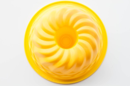 Flexible silicone form for baking cake isolated on white backgroundの写真素材