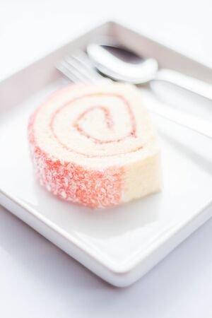 Sweet dish of pink jam roll cake, stock photoの写真素材